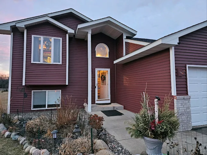 Storm damage exterior restoration including siding, windows, and gutters in Maple Grove and Twin Cities area